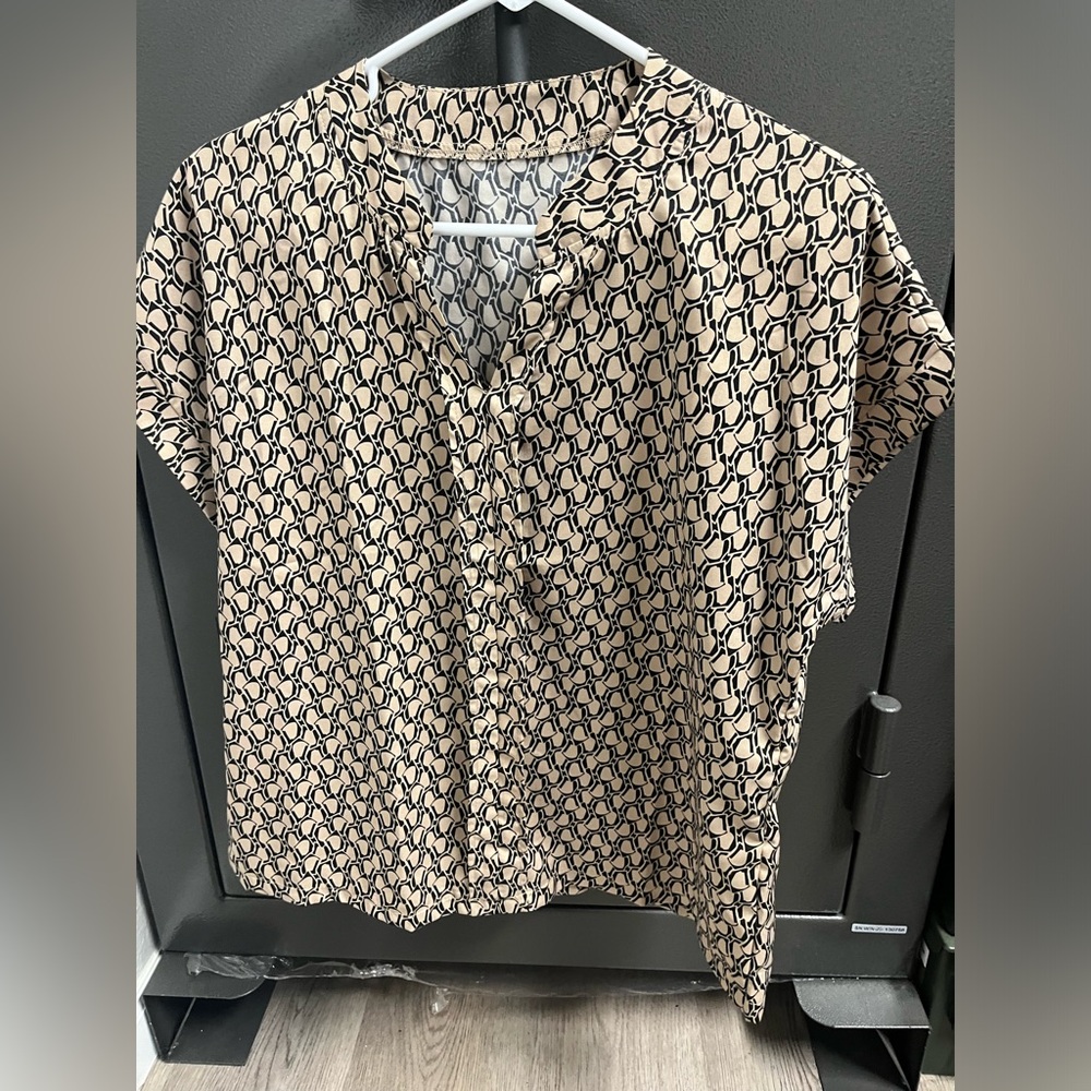 Women’s dress blouse.  Rayon fabric.